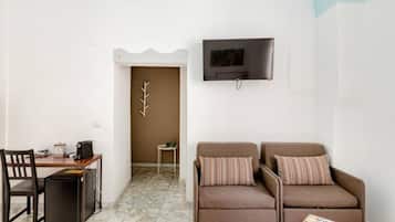 Classic Quadruple Room, City View | Desk, laptop workspace, free WiFi
