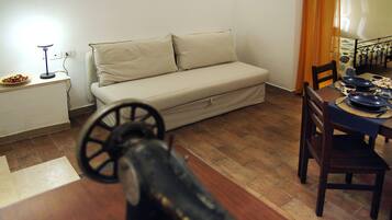 Family Loft | Living area | 30-inch flat-screen TV with digital channels