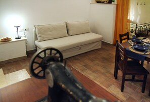 Family Loft | Living area | 30-inch flat-screen TV with digital channels