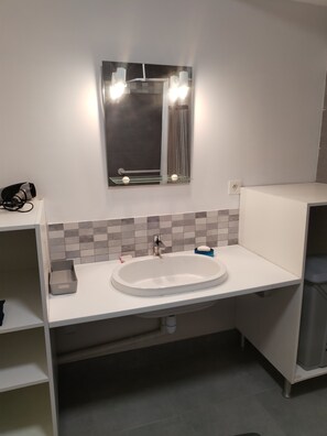 Hair dryer, towels, soap, toilet paper