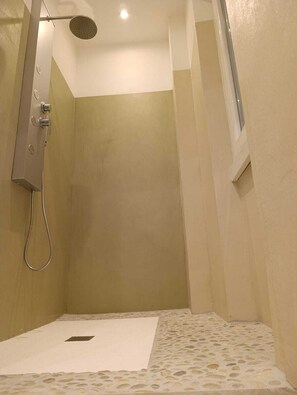 Shower, jetted tub, hair dryer, bidet