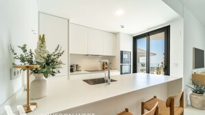 Coffee/tea maker, fridge, microwave, oven