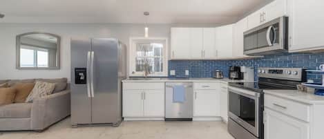 Coffee/tea maker, high chair, cookware/dishes/utensils