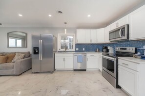 Coffee/tea maker, highchair, cookware/dishes/utensils