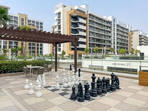 Outdoor dining - Modern 1 BD with Spacious Terrace (Dubai)