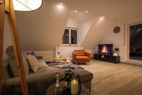 Central, stylish and modern holiday apartment with balcony and box-spring beds