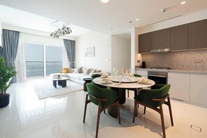 Deluxe Apartment, Balcony, Sea View | Living area | 125-cm flat-screen TV with digital channels, Netflix, streaming services