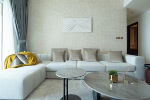 Deluxe Apartment, Balcony, Sea View | Living area | 125-cm flat-screen TV with digital channels, Netflix, streaming services