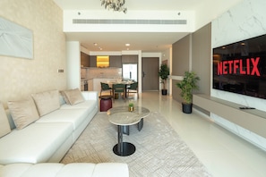 Deluxe Apartment, Balcony, Sea View | Living area