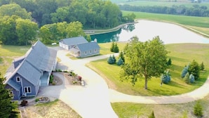 A residential property with a large house, a smaller building, and a pond. - Mirror Lake - Rare private lake! (Scales Mound)