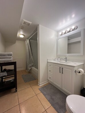 Hair dryer, towels, soap, toilet paper