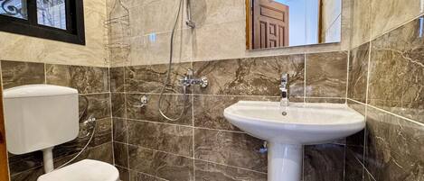 Hair dryer, towels, soap, toilet paper