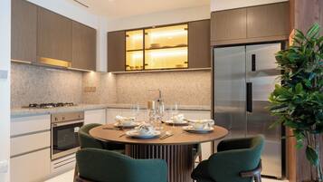 Deluxe Apartment, Balcony, Sea View | Living area | 125-cm flat-screen TV with digital channels, Netflix, streaming services