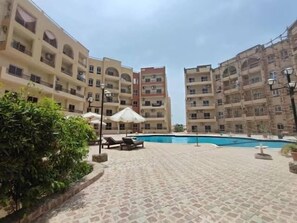 Outdoor pool - Level One Living , Morden comfort in a prime location compound feels like Home (Hurghada)