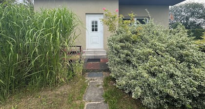 Idyllic bungalow surrounded by greenery, perfect for relaxing.