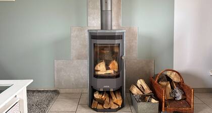 Idyllic bungalow surrounded by greenery, perfect for relaxing.