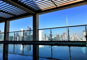 Pool - Cozy 1-bedroom hotel suite with AC, Business bay (Dubai)