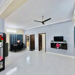 In-room safe, desk, laptop workspace, blackout curtains - ORION Studio service Apartments (Hyderabad)