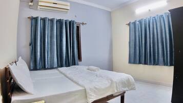 In-room safe, desk, laptop workspace, blackout curtains