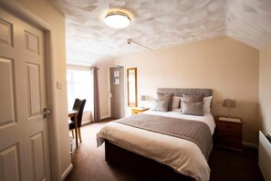 Desk, free WiFi, bed sheets