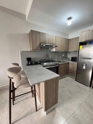 Fridge, microwave, oven, coffee/tea maker