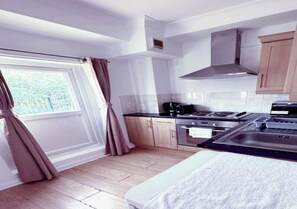 Microondas, placa de cocina