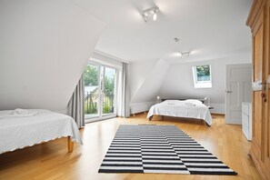 4 bedrooms, desk, iron/ironing board, travel cot