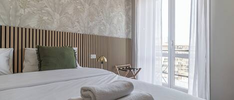 3 عدّة غرف نوم ومكواة/لوح كي وواي فاي مجانًا وملاءات أسرّة