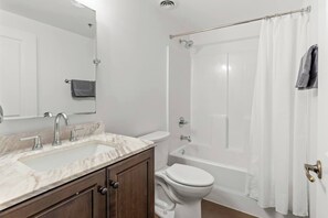 Hair dryer, towels, soap, toilet paper