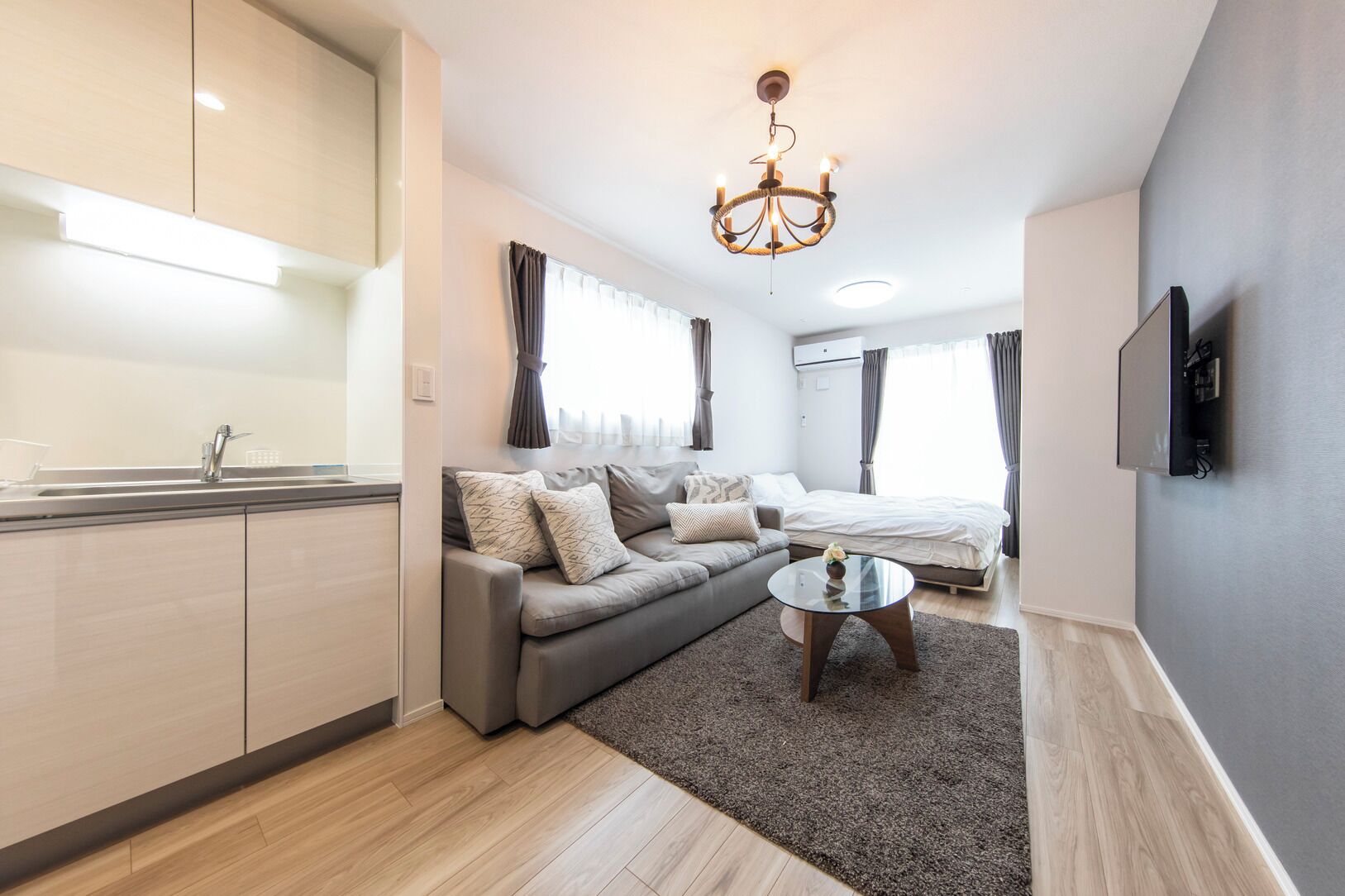 Logement Aile Room 102 - 1K, Non-Smoking (Luxury Design Apartment) | Living area | Flat-screen TV