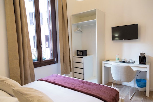 Deluxe Double Room | In-room safe, blackout drapes, iron/ironing board, free WiFi