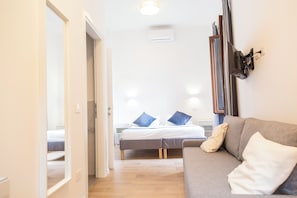 Family Room | In-room safe, blackout drapes, iron/ironing board, free WiFi