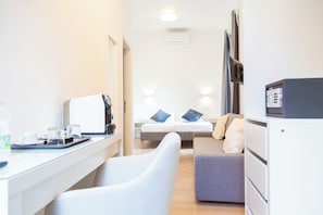 Family Room | In-room safe, blackout drapes, iron/ironing board, free WiFi