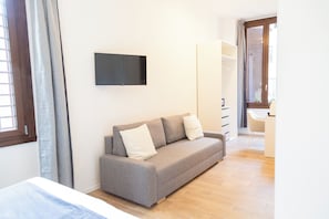 Family Room | In-room safe, blackout drapes, iron/ironing board, free WiFi