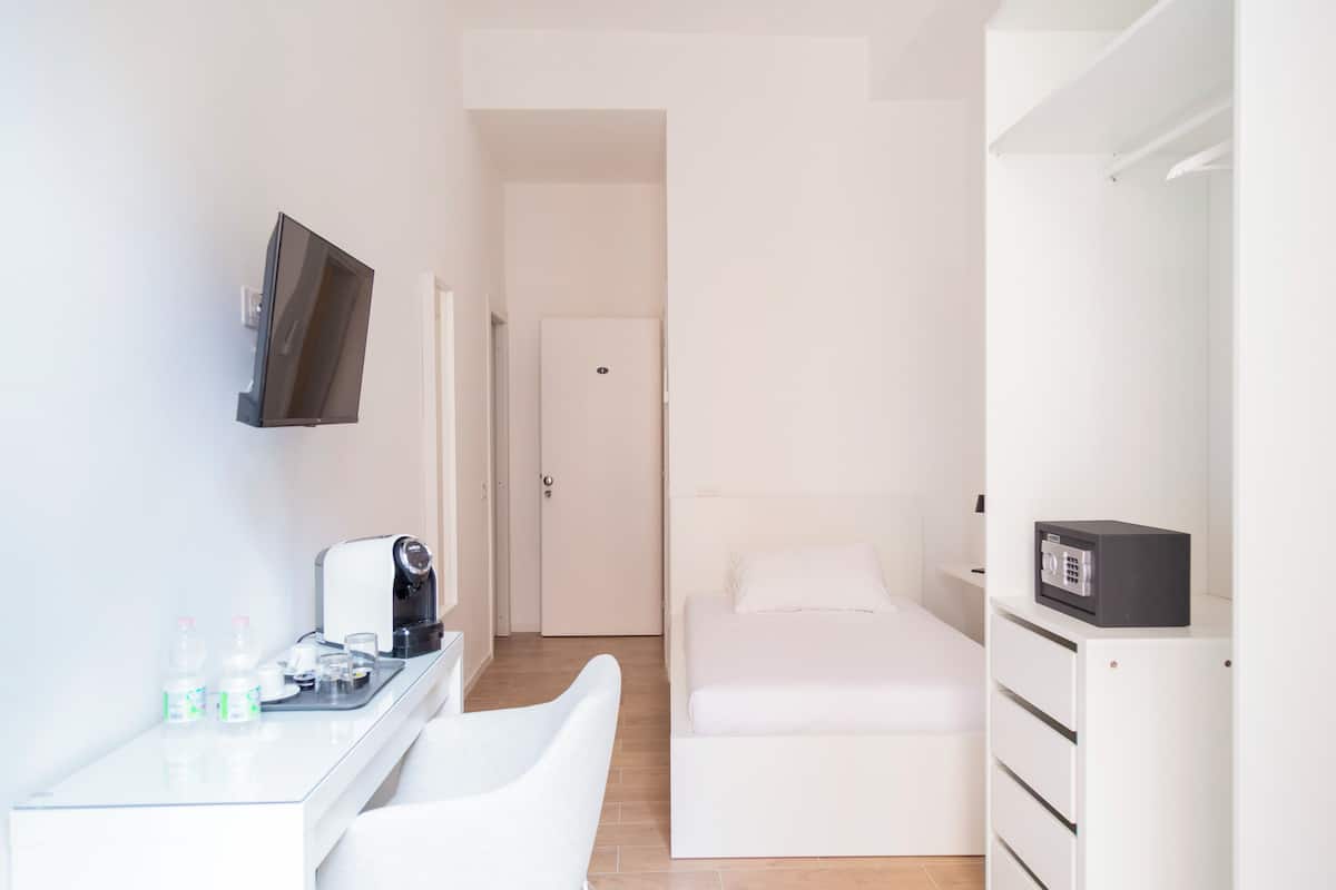 Classic Single Room, Balcony, Courtyard View | In-room safe, blackout drapes, iron/ironing board (on request)