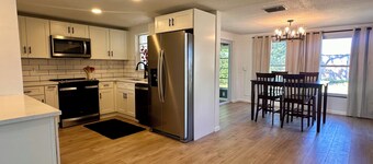 Sunny 2BR Retreat · Enclosed Patio · Pet Friendly · Near Gulf Beaches