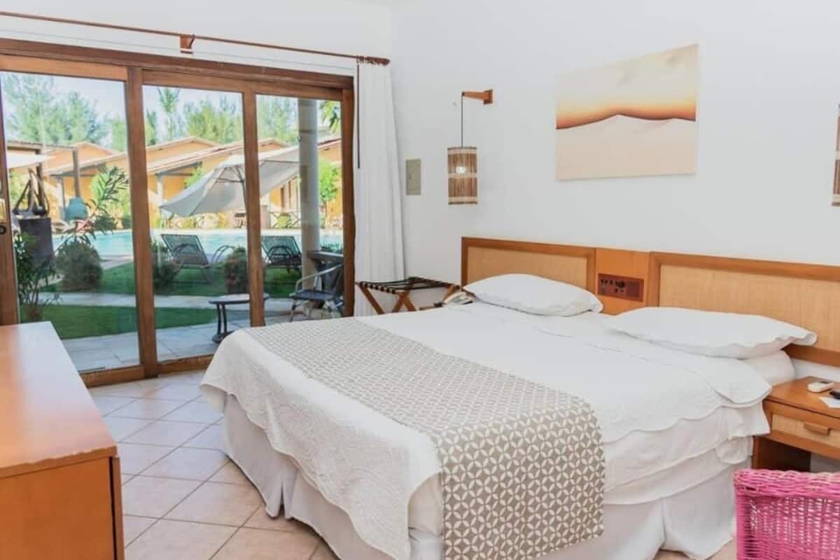 Deluxe Quadruple Room, Garden View | In-room safe, blackout curtains, free WiFi