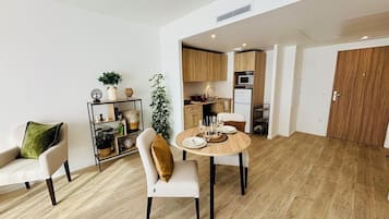 Basic Apartment, Balcony | Living area