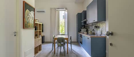 Deluxe Apartment, Balcony | Private kitchen | Microwave, oven, stovetop, espresso maker