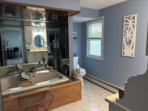 Jetted bath, hair dryer, towels, soap