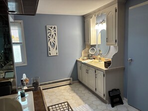 Jetted bath, hair dryer, towels, soap