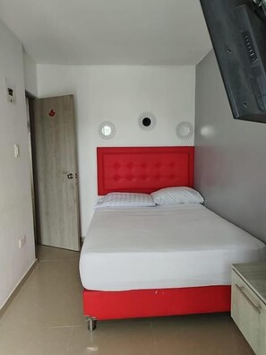 Cofres nos quartos, cortinas blackout, Wi-Fi de cortesia, roupa de cama