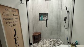 Shower, hair dryer, towels, soap