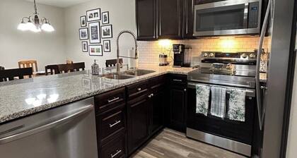 WALK TO TOOMER'S from this condo on the Rolling Plains.