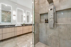 Shower, hair dryer, towels, soap