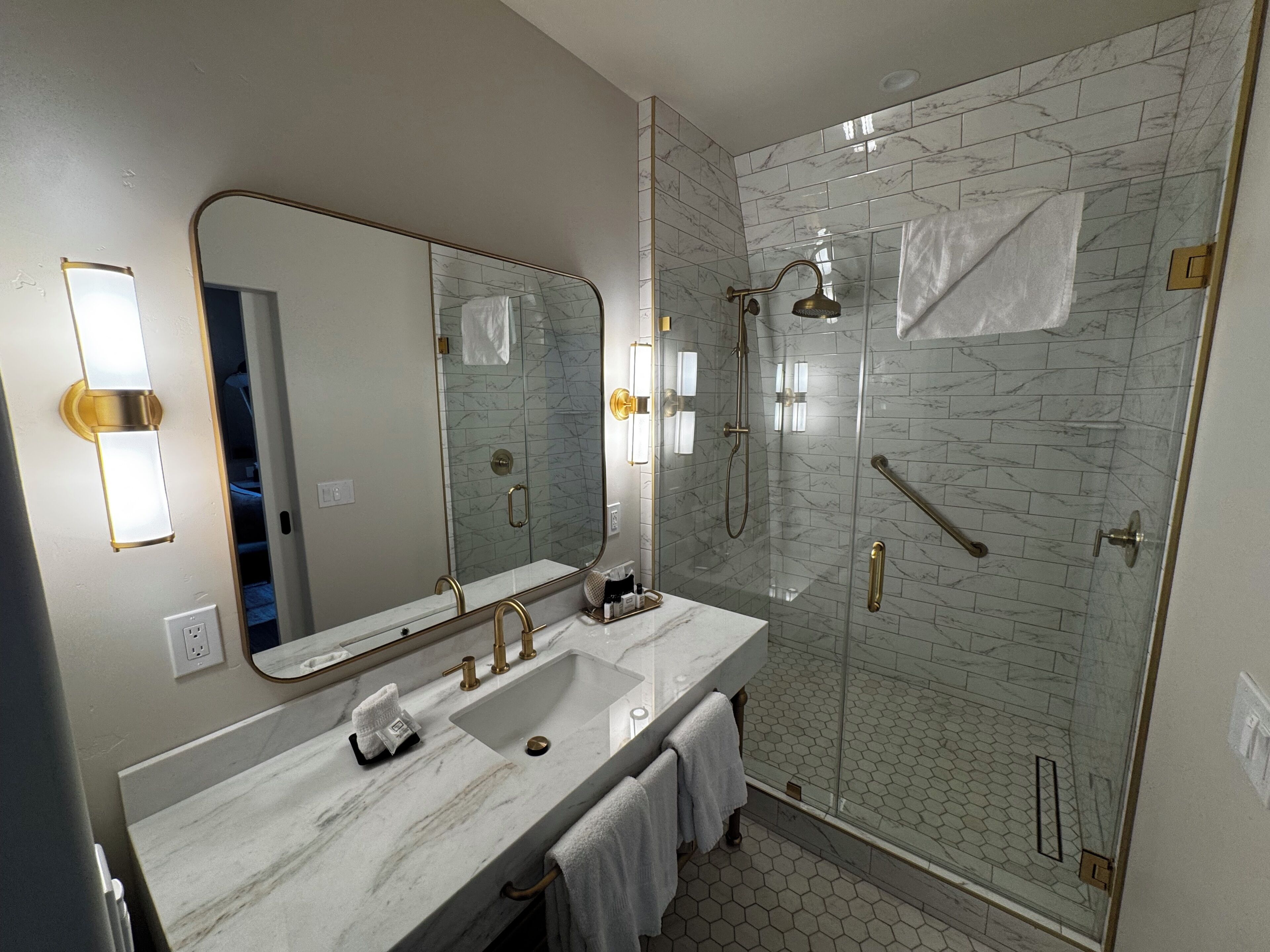 Deluxe Room, Patio | Bathroom | Hair dryer, slippers, towels, soap