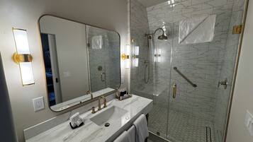 Deluxe Room, Patio | Bathroom | Hair dryer, slippers, towels, soap