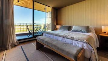 Suíte estúdio superior, vista para a praia | Cofres nos quartos, Wi-Fi de cortesia