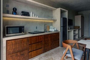 Fridge, microwave, stovetop, coffee/tea maker
