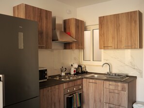 ห้องดีลักซ์ดูเพล็กซ์, ระเบียง, วิวเมือง | บริเวณนั่งเล่น